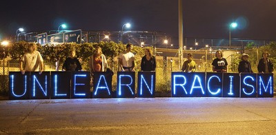 Unlearn Racism In Lights